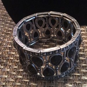 Silver and black stretch bracelet.